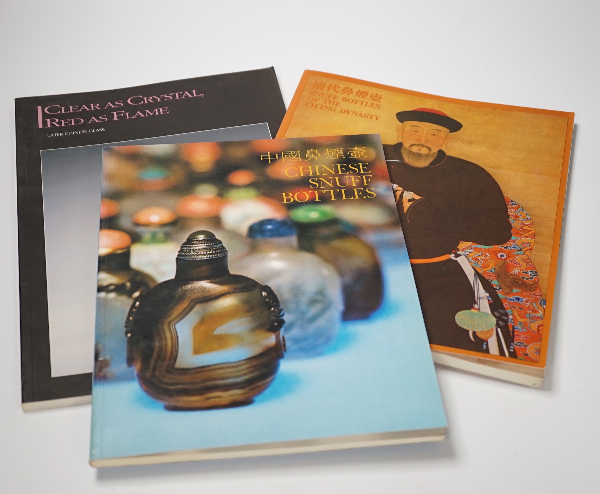 Three reference books comprising Clear as Crystal, Later Chinese Glass, Snuff bottles of the Ch’ing Dynasty and Chinese Snuff Bottles